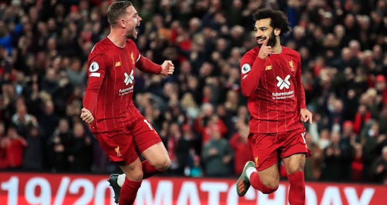 Salah e Henderson comemoram gol do Liverpool: clássico com Tottenham faz ESPN ter jogo mais visto do fim de semana na TV paga (Divulgação)